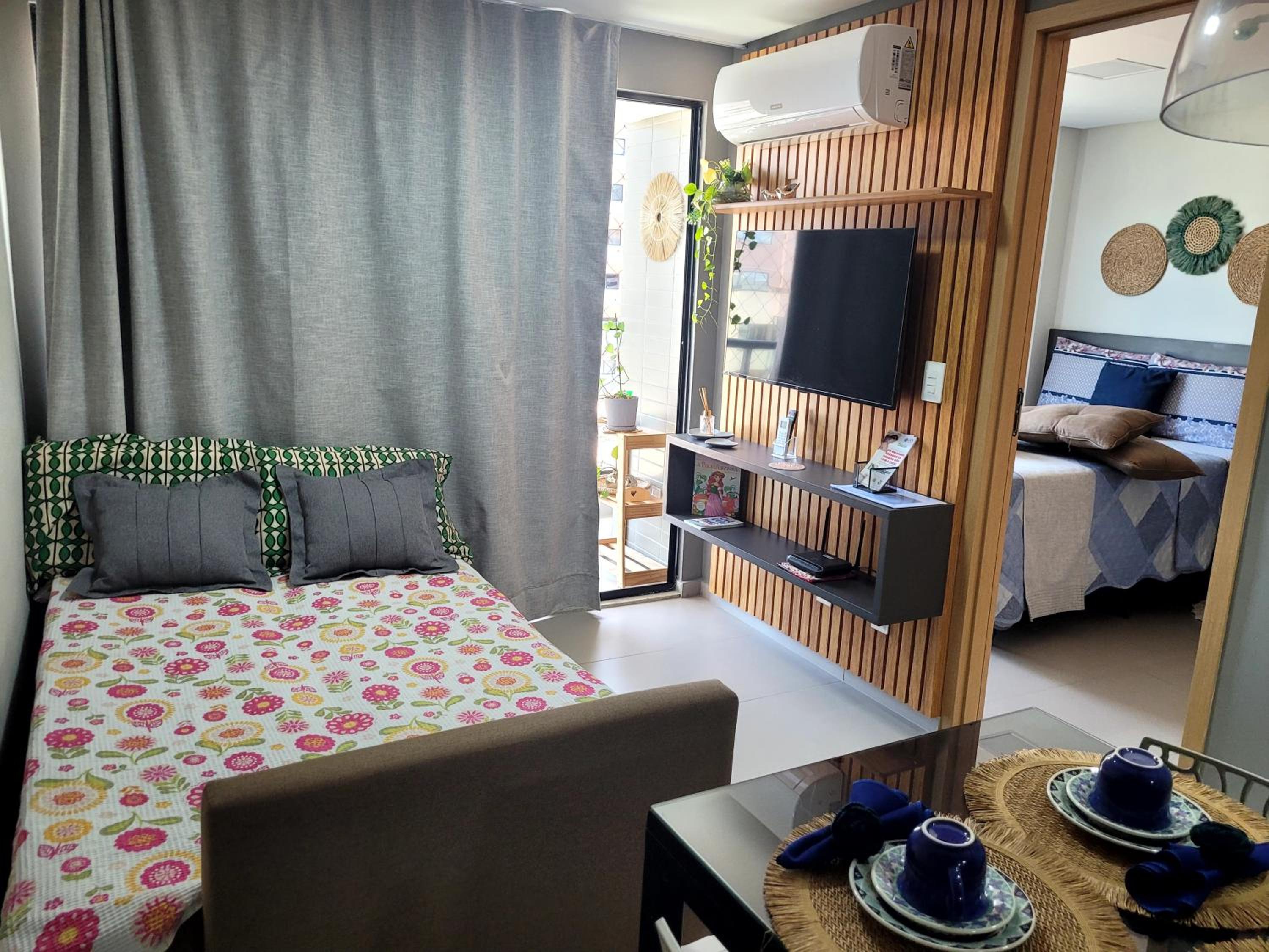 Flat com dois quartos na praia do Cabo Branco - climatizado e completo