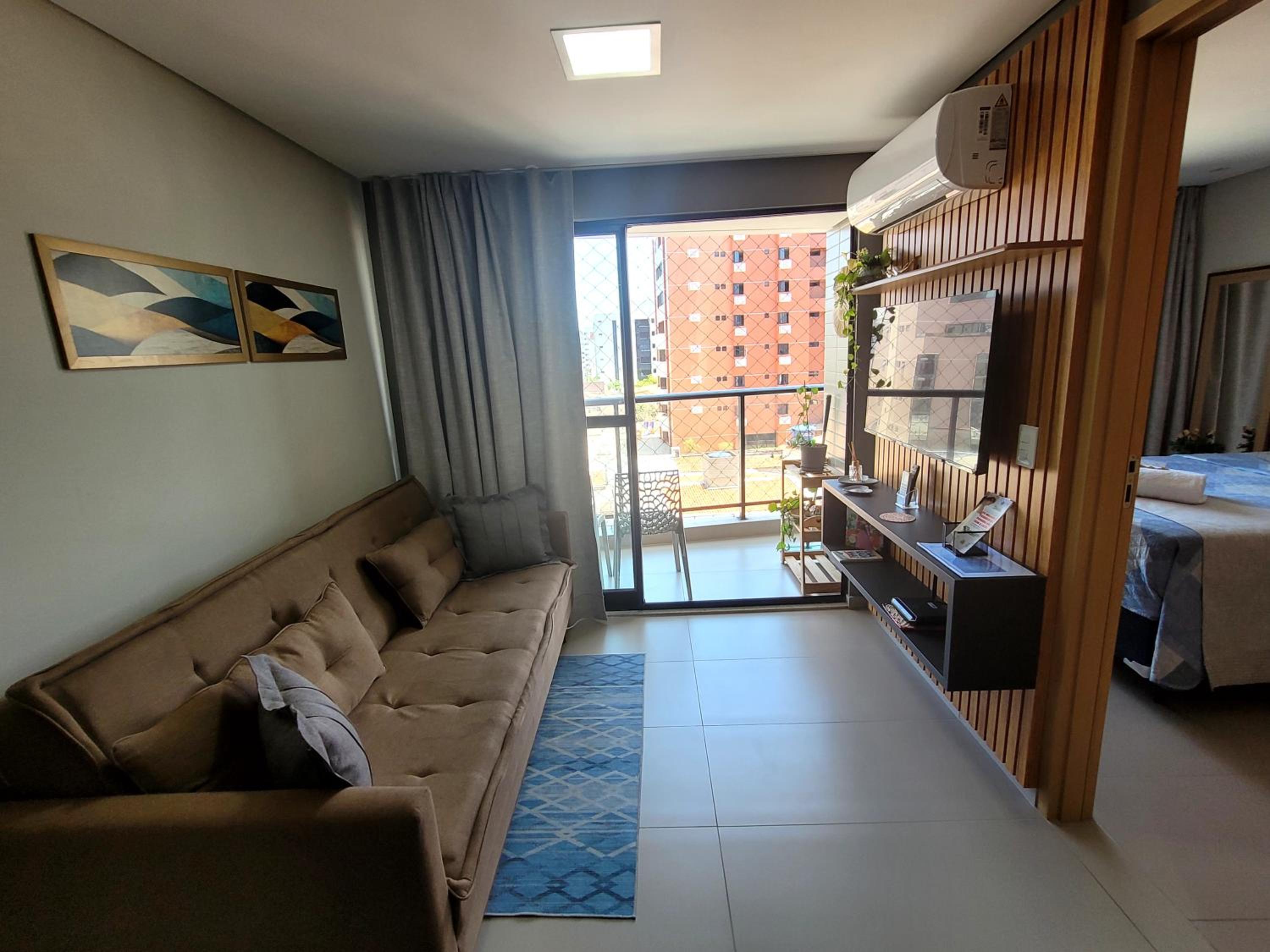 Flat com dois quartos na praia do Cabo Branco - climatizado e completo