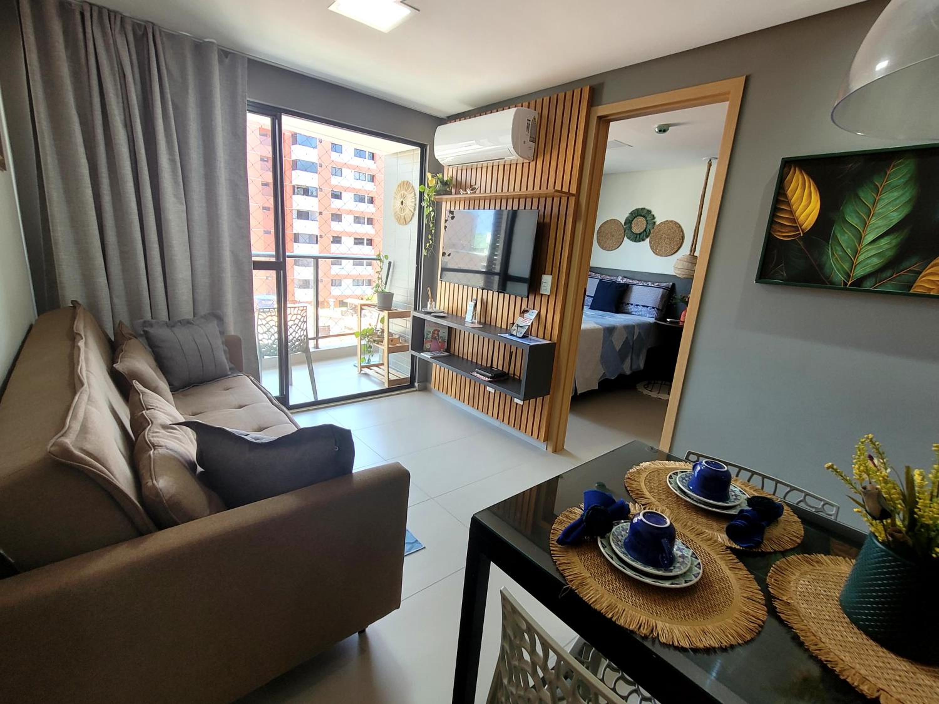 Flat com dois quartos na praia do Cabo Branco - climatizado e completo