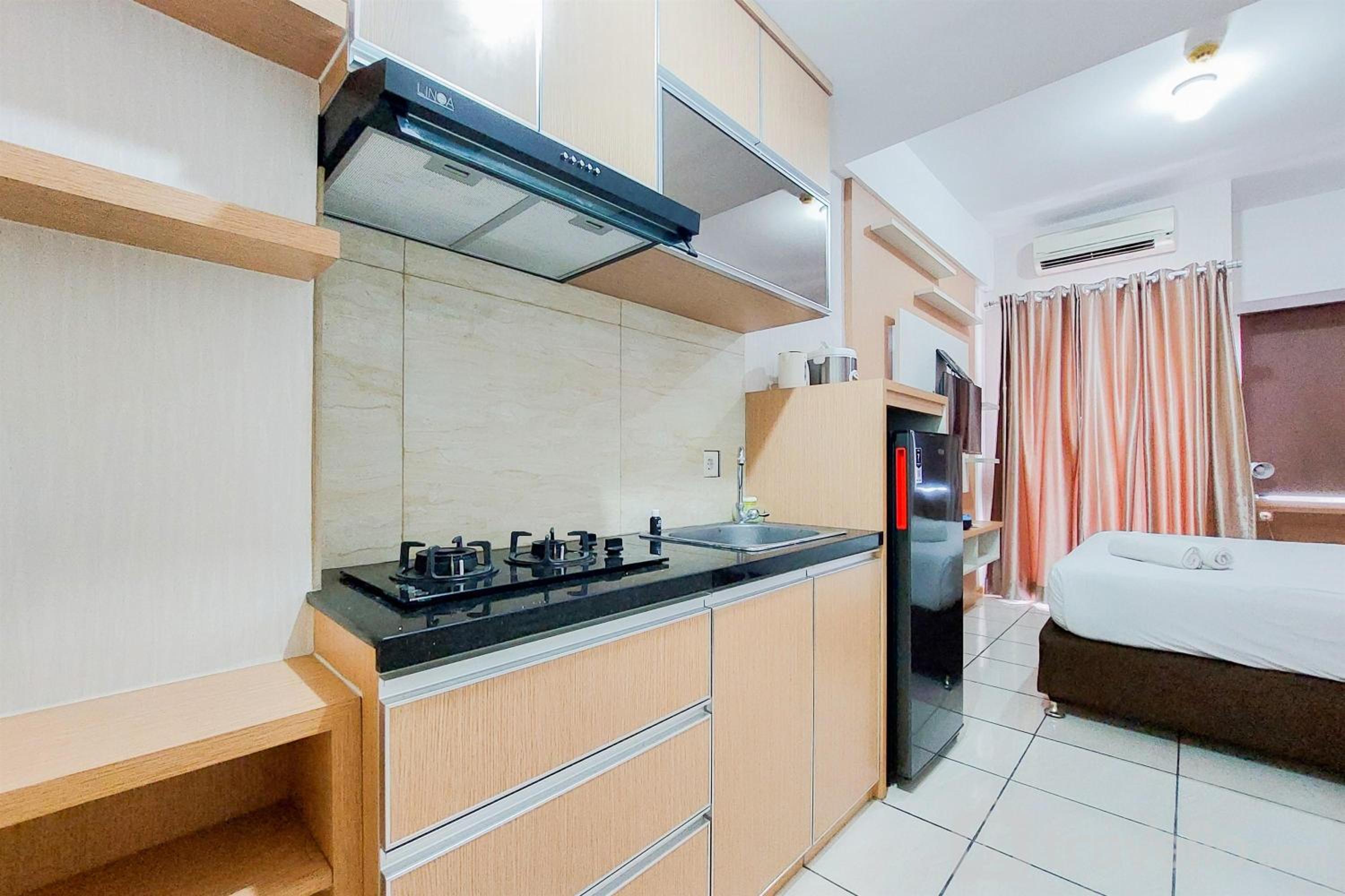 Best Cozy Stay Studio Apartment at 10th Floor M-Town Residence By Travelio