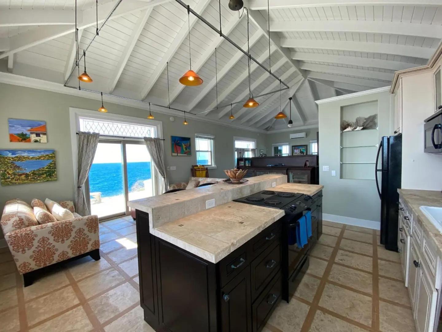 Honeymoon Cottage Atop a rocky peninsula surrounded by the Caribbean Sea view 5