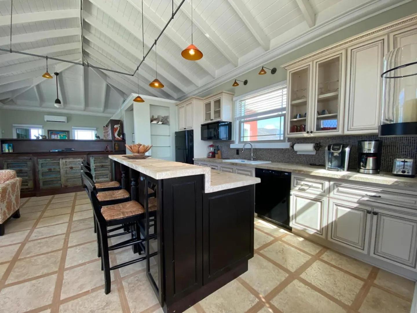 Honeymoon Cottage Atop a rocky peninsula surrounded by the Caribbean Sea view 4