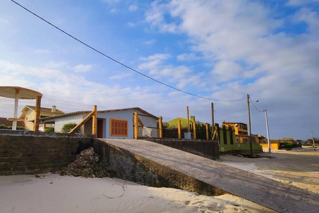 Casa pé na areia