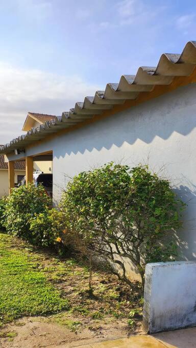Casa pé na areia