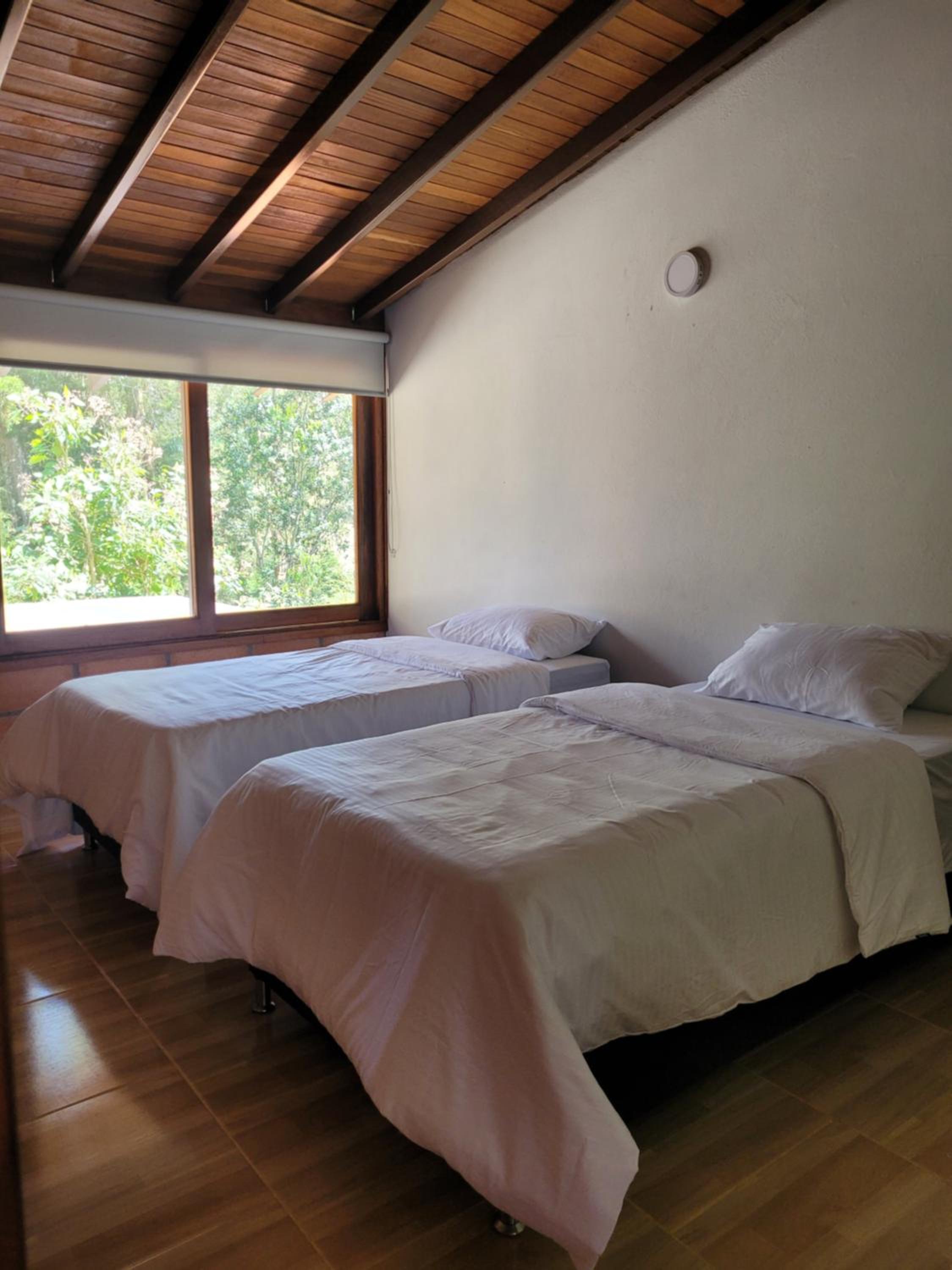 La Pascana Ecolodge frente al parque Arví Entorno natural excepcional, reserva natural, áreas protegidas, conexión con la naturaleza y avistamiento de aves