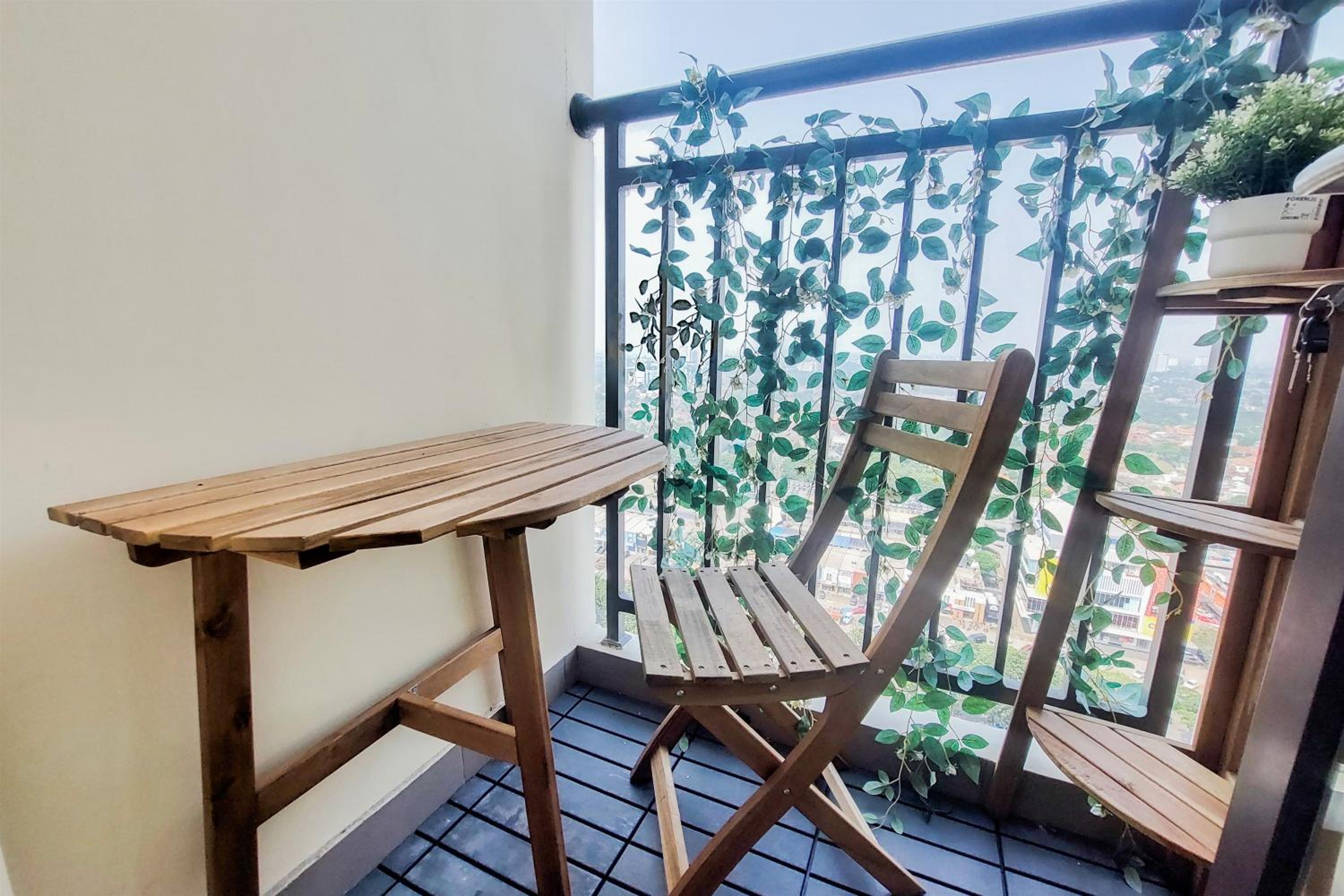 Simply and Cozy Living Studio Transpark Bintaro Apartment By Travelio