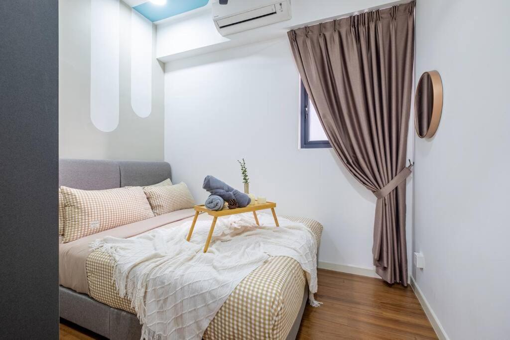 M Vertica Tower B by Feel Home