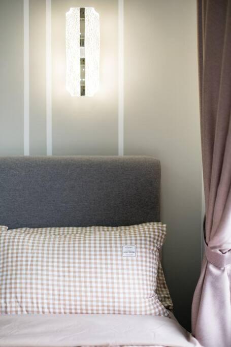 M Vertica Tower B by Feel Home