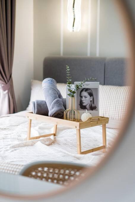 M Vertica Tower B by Feel Home