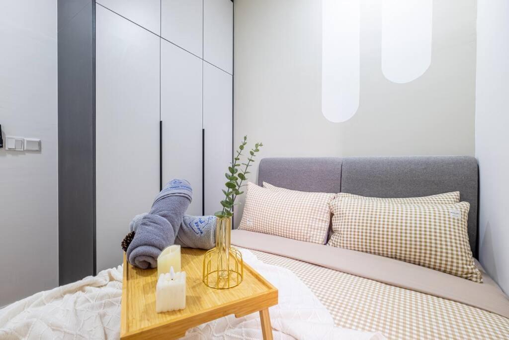 M Vertica Tower B by Feel Home
