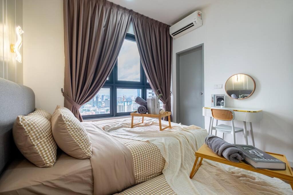 M Vertica Tower B by Feel Home
