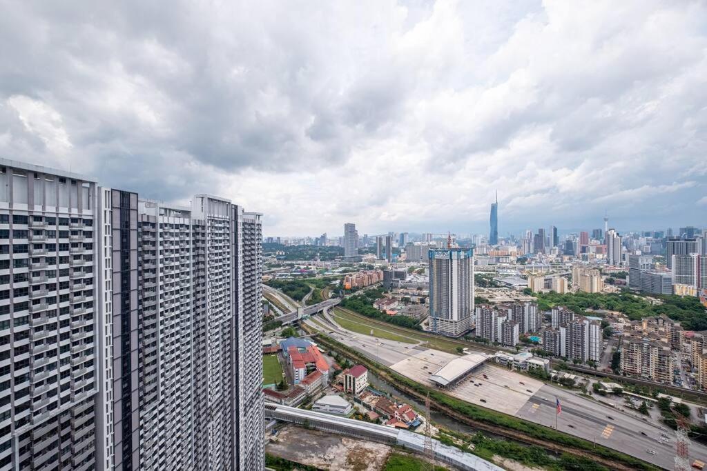M Vertica Tower B by Feel Home
