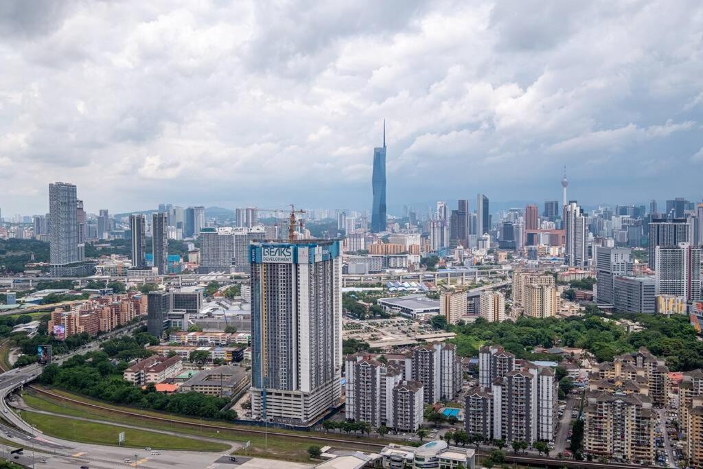 M Vertica Tower B by Feel Home