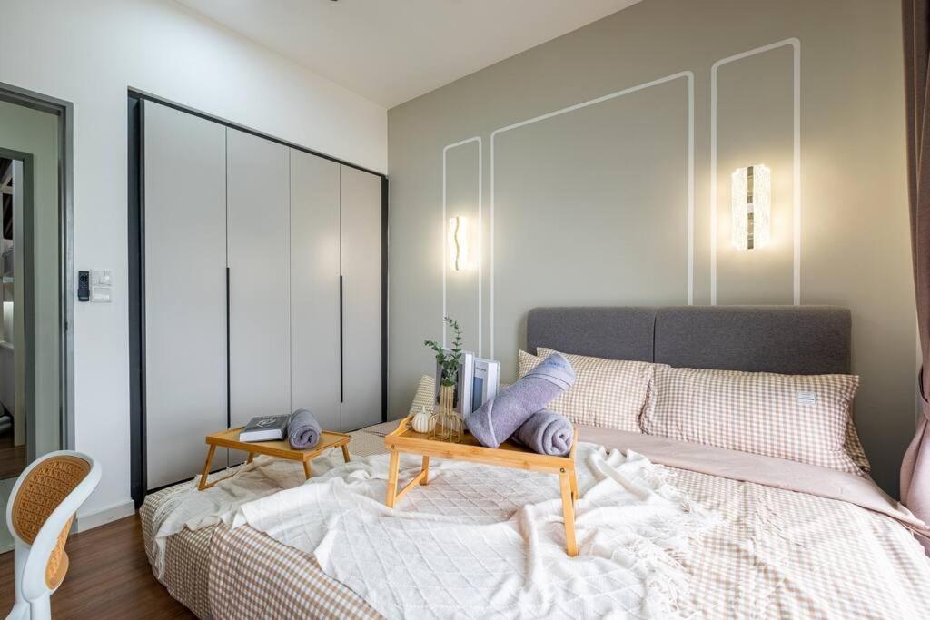 M Vertica Tower B by Feel Home