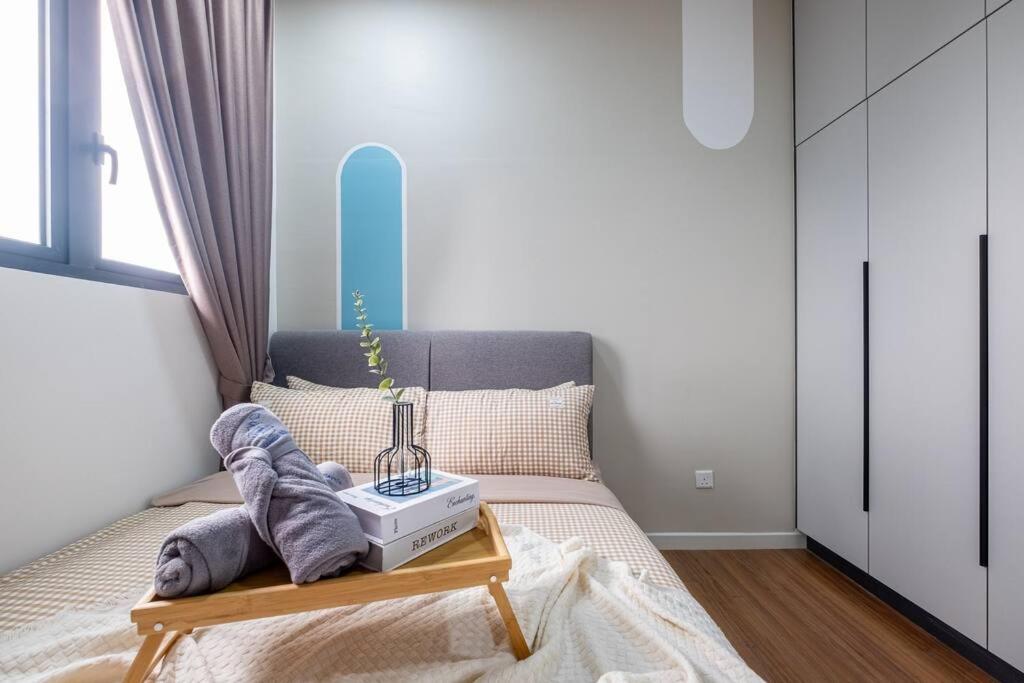 M Vertica Tower B by Feel Home