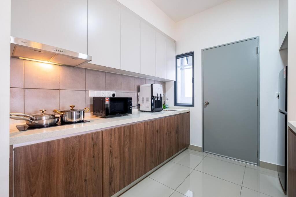 M Vertica Tower B by Feel Home