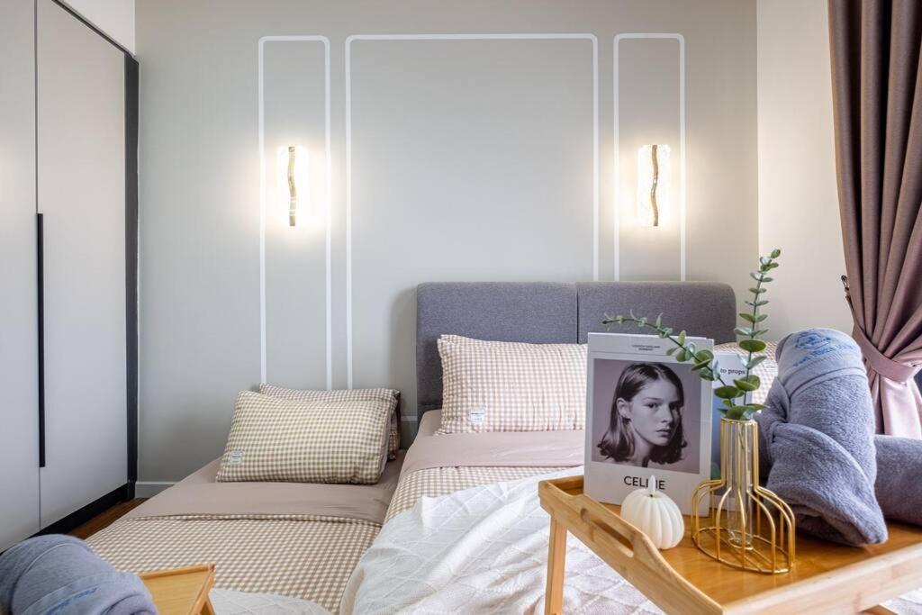M Vertica Tower B by Feel Home