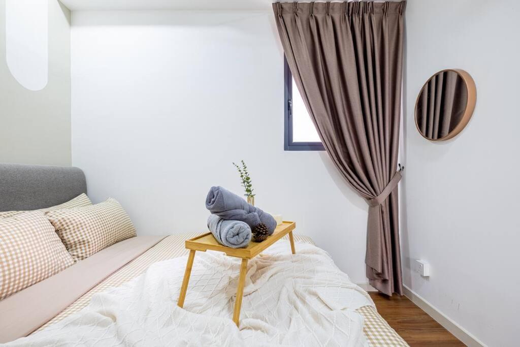 M Vertica Tower B by Feel Home