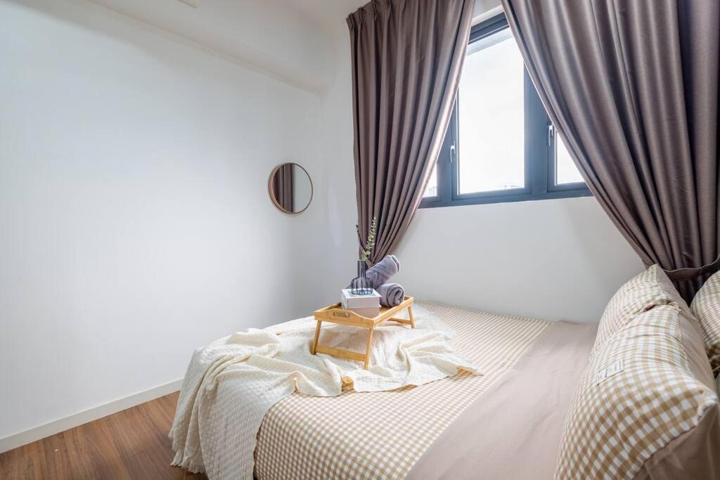 M Vertica Tower B by Feel Home