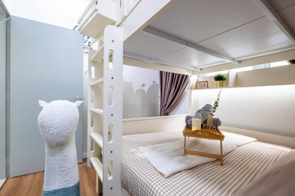 M Vertica Tower B by Feel Home