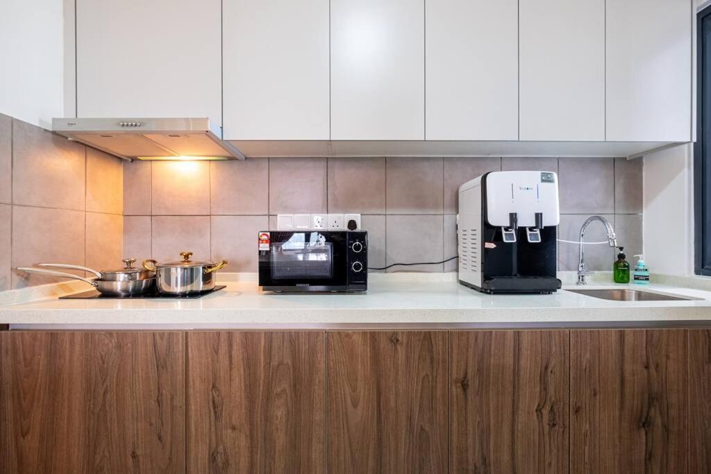 M Vertica Tower B by Feel Home