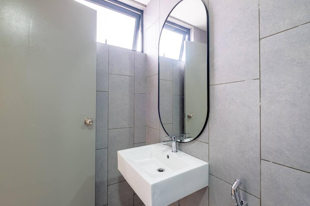 M Vertica Tower B by Feel Home