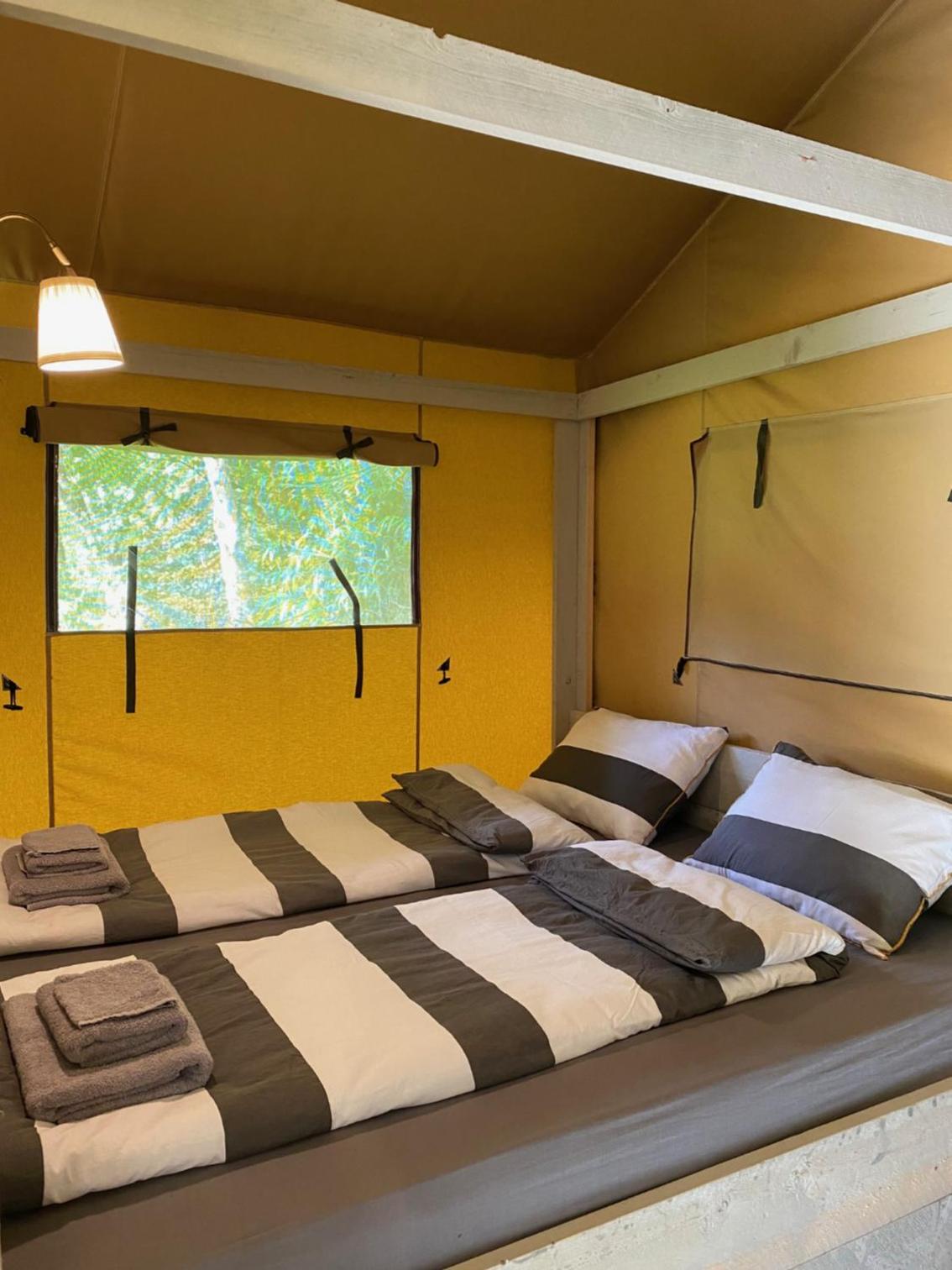 Glamping tent in oase van groen