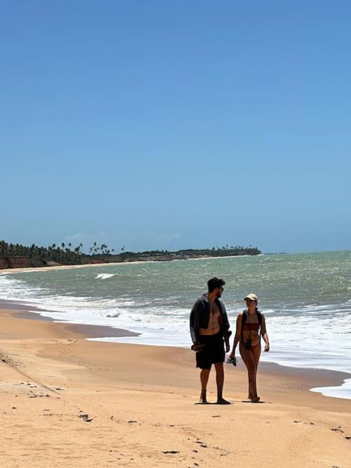 Falésia House Cumuruxatiba - pé na areia