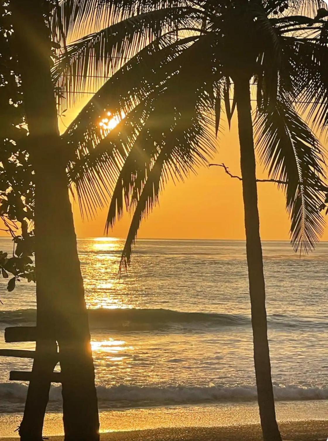 Beachfront sunset Bungalow