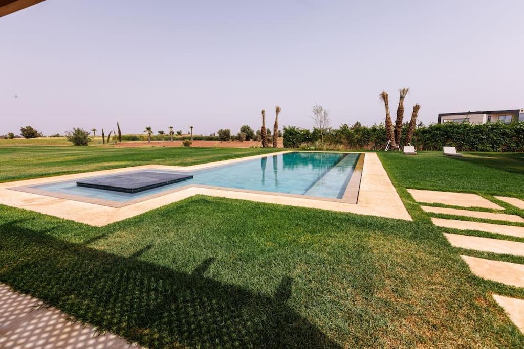 Modern 4BR Villa Golf View in Amelkis Marrakech view 2