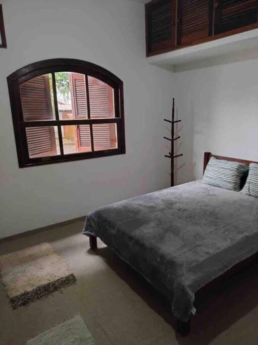 Casa com piscina e área gourmet externa
