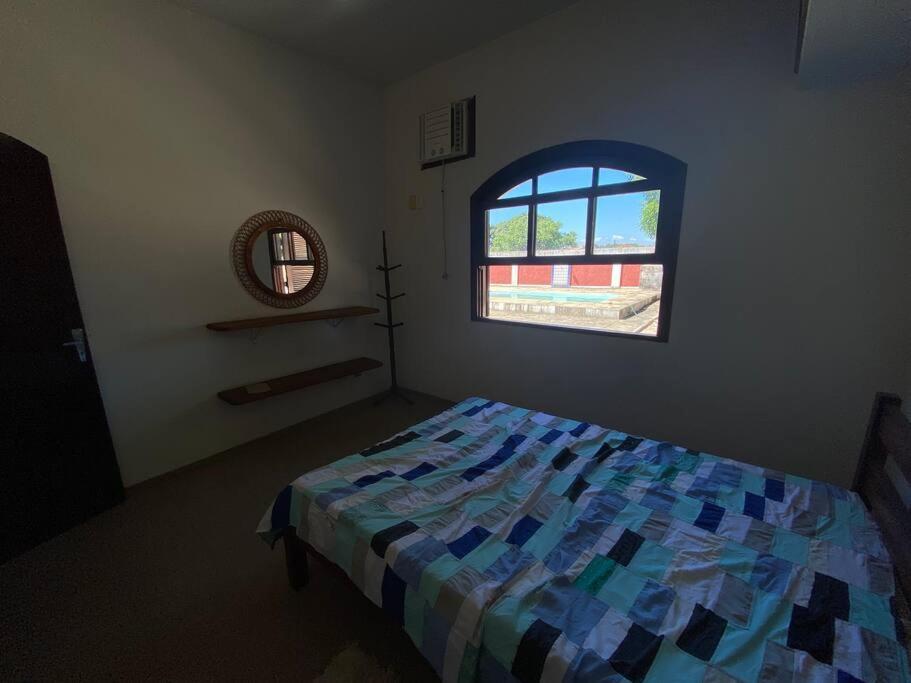 Casa com piscina e área gourmet externa