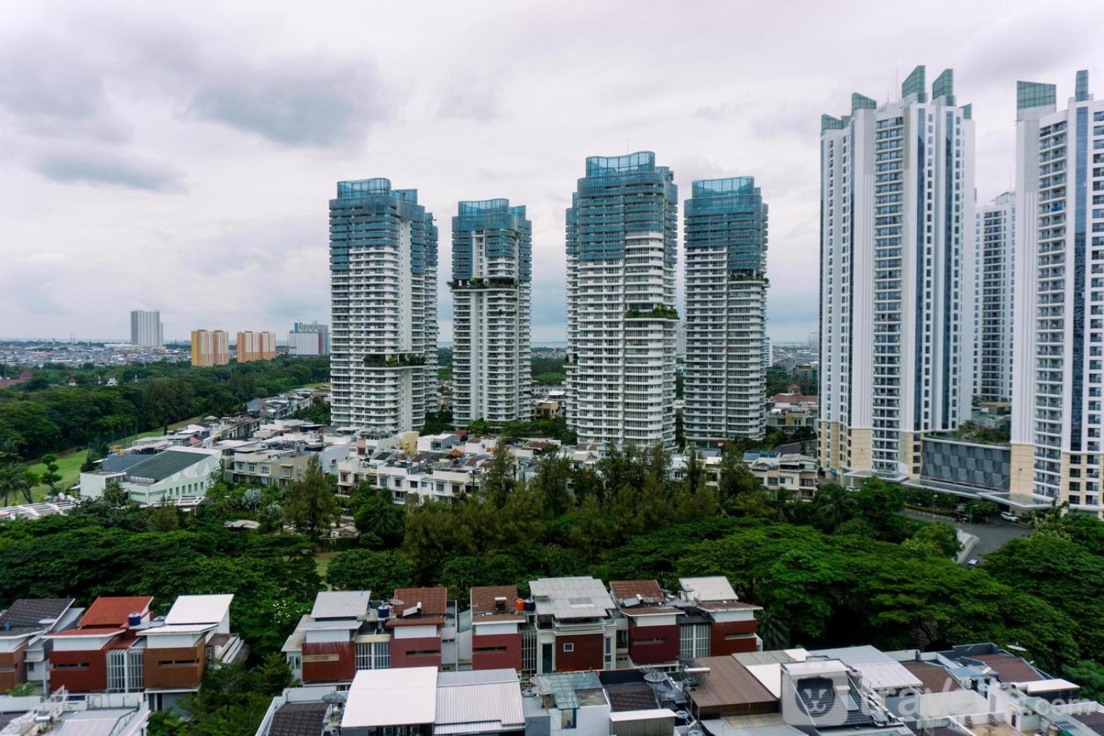 Great Deal 2BR Apartment Springhill Terrace Residence By Travelio