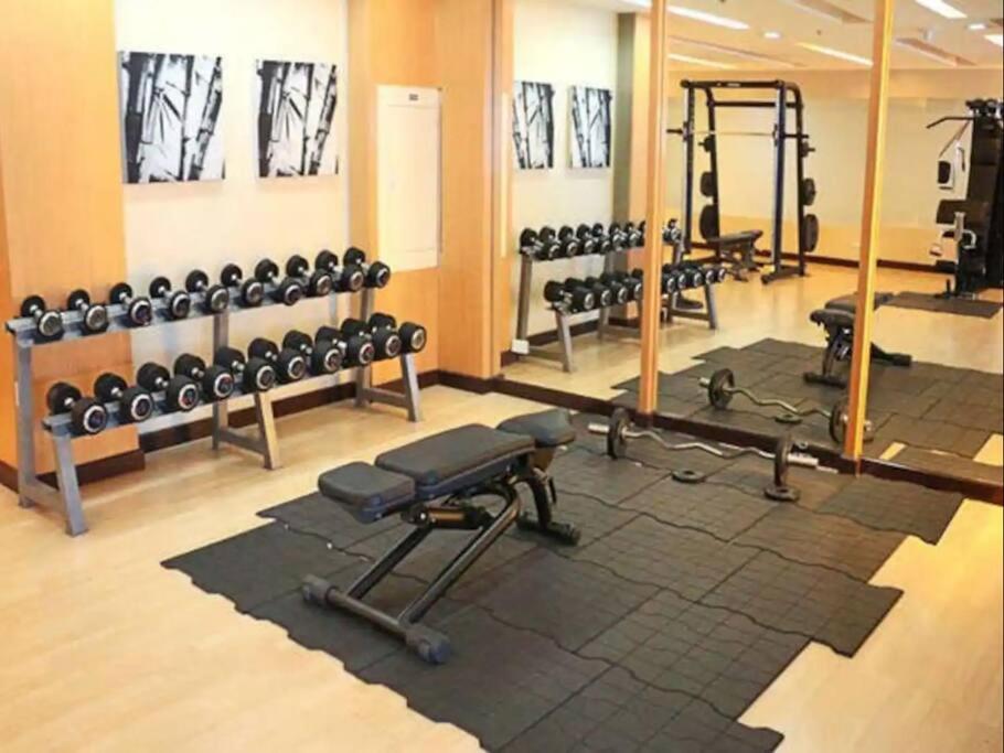 1br wNetflix Disneyplus and pool across SM Megamall Ortigas CBD view 3