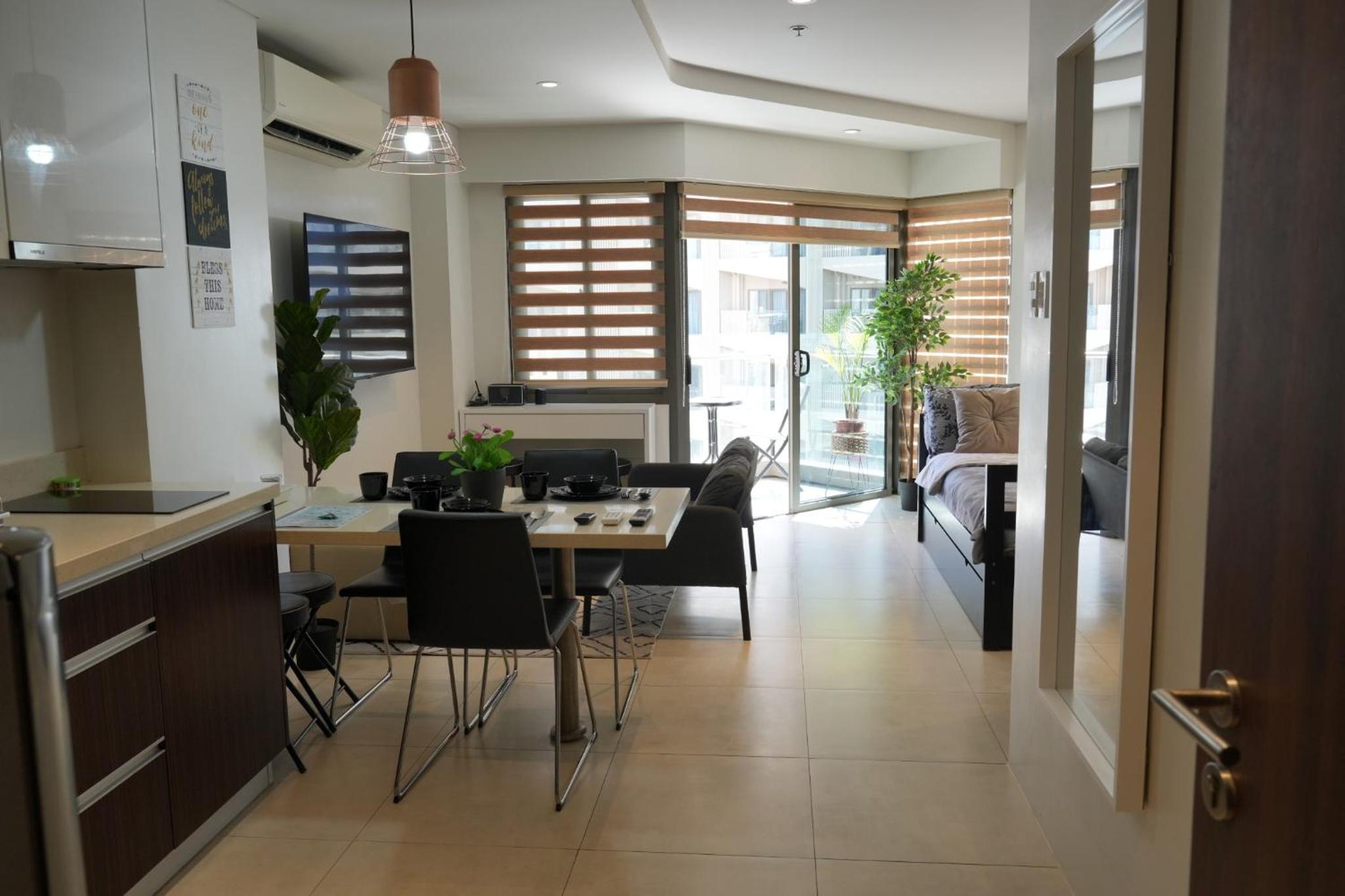 Studio for 5 at Tambuli Residences Garden View by Dominik Studio Apartment with Pool Access & Balcony in Mactan