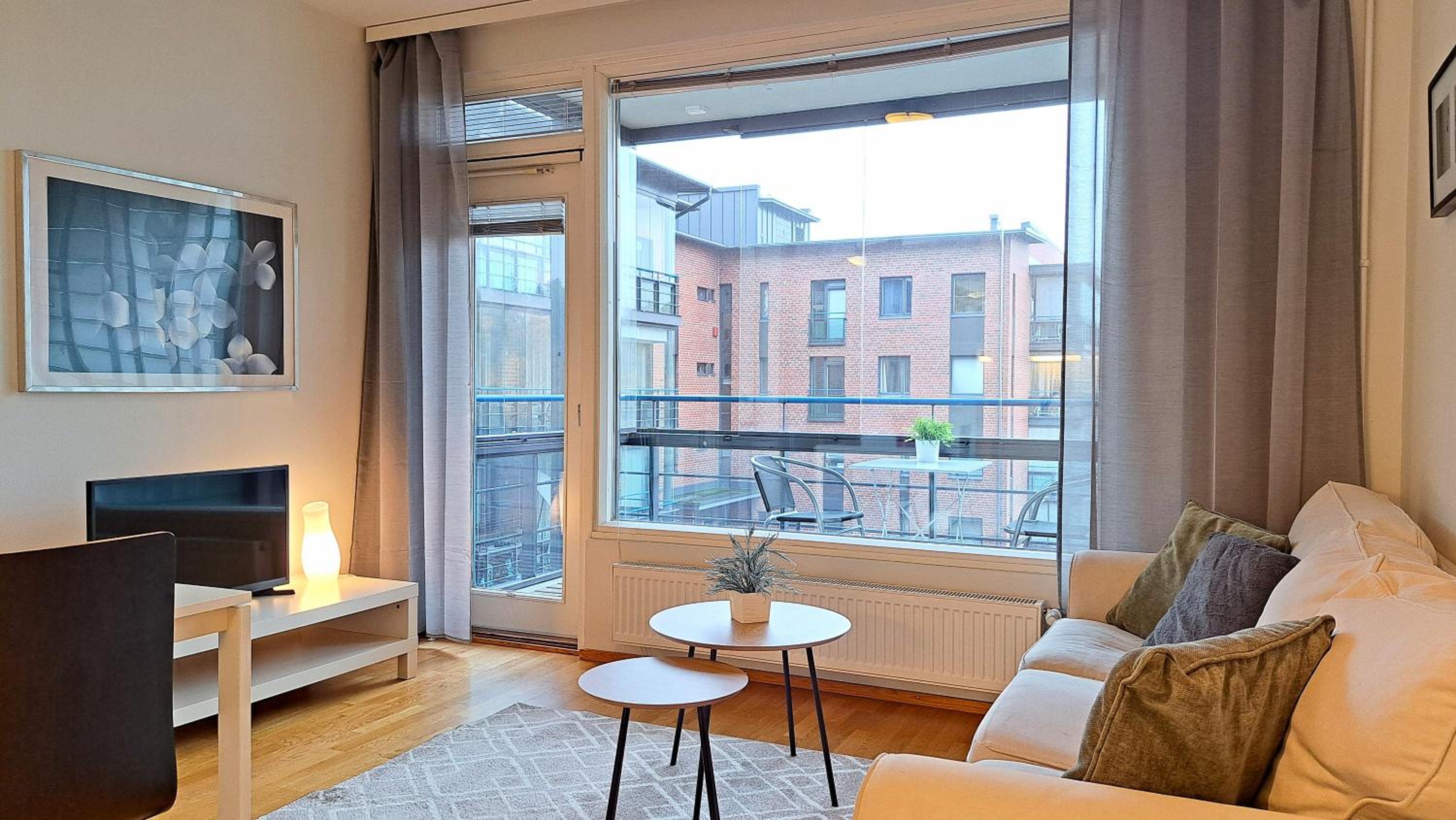 Kotimaailma Apartments - saunallinen kaksio koskinäkymällä - Verstaankatu