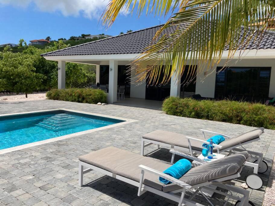 Luxe villa op Coral Estate 1 min lopen van zee