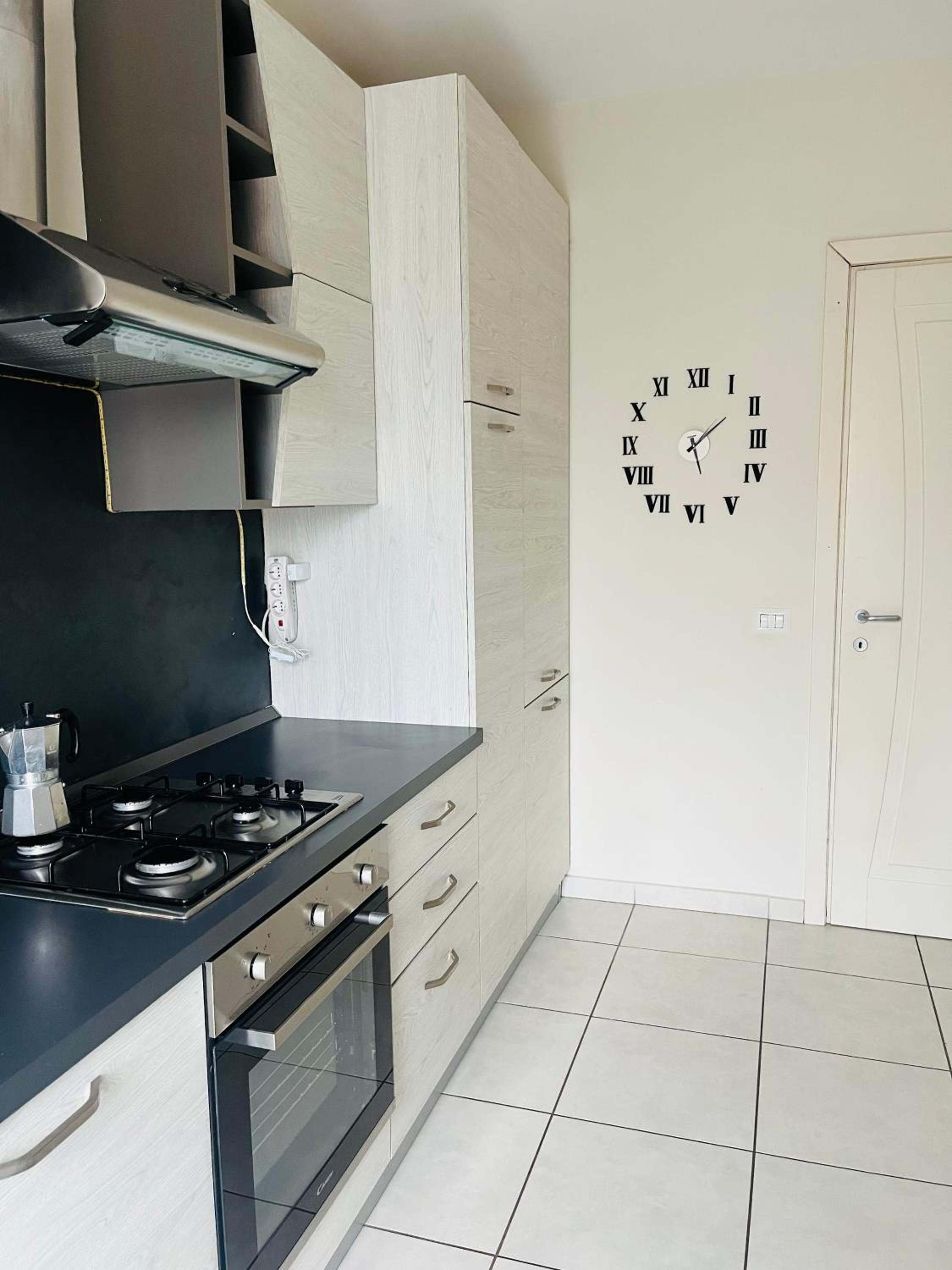 Casa Enea en Olbia — kitchen
