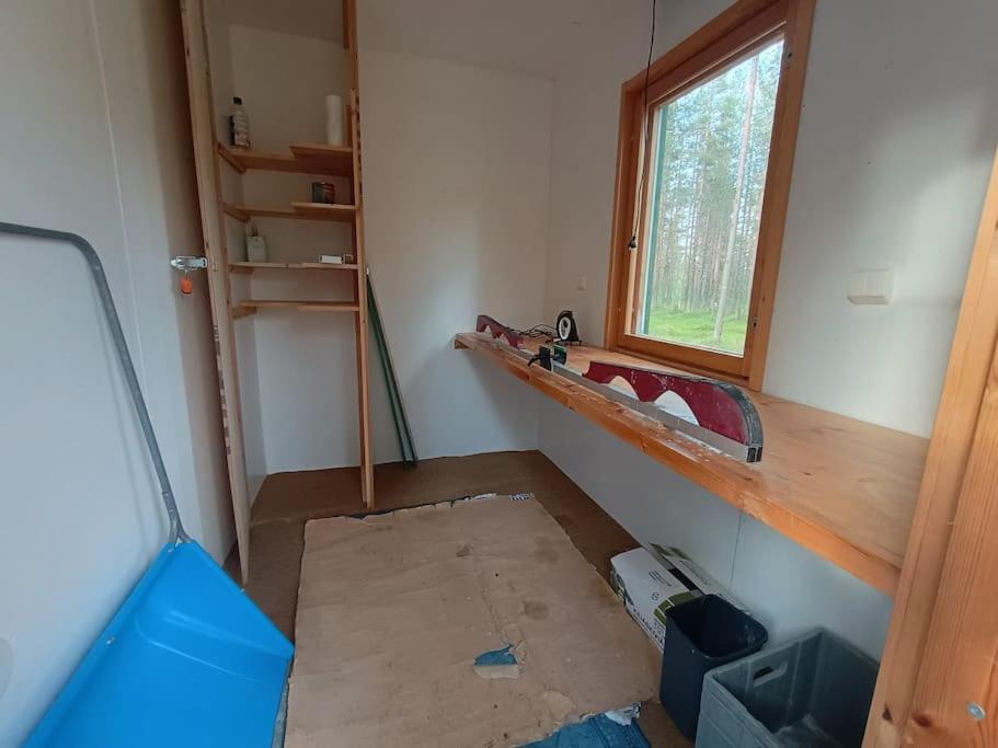 Kotoisa hirsihuvila Ylläksellä