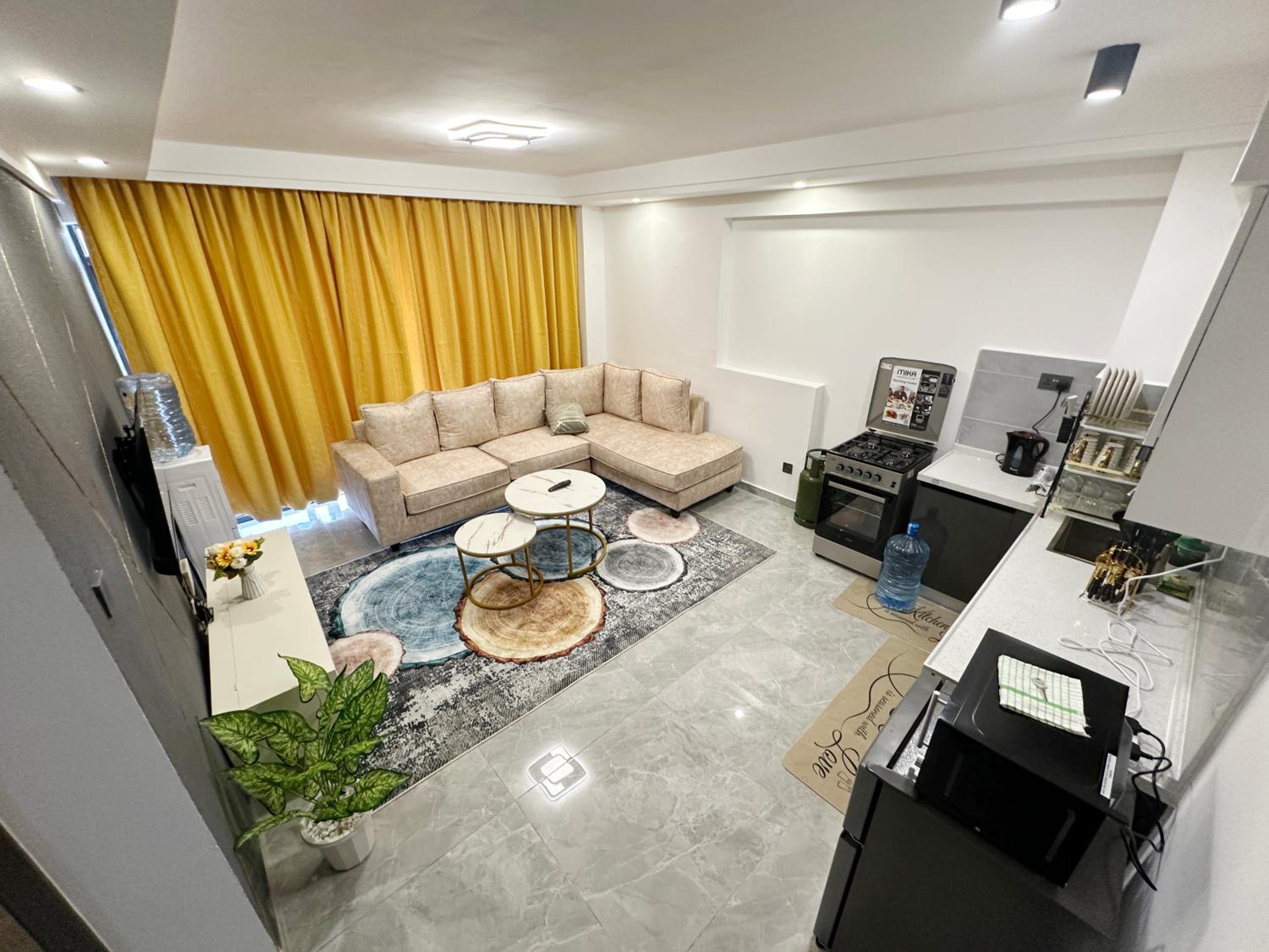 Modern 1-Bedroom Apartment in Nairobi with Balcony, Gym, & Fast WiFi view 2