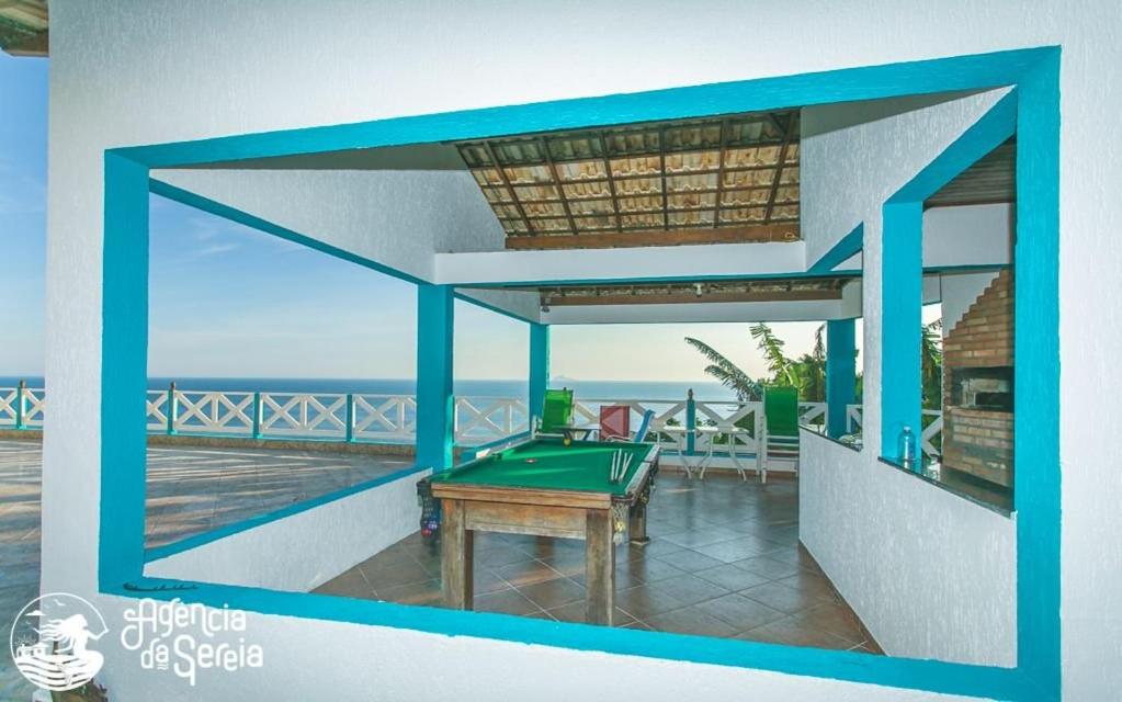 Casa costeira com vista e área gourmet no Borrifos