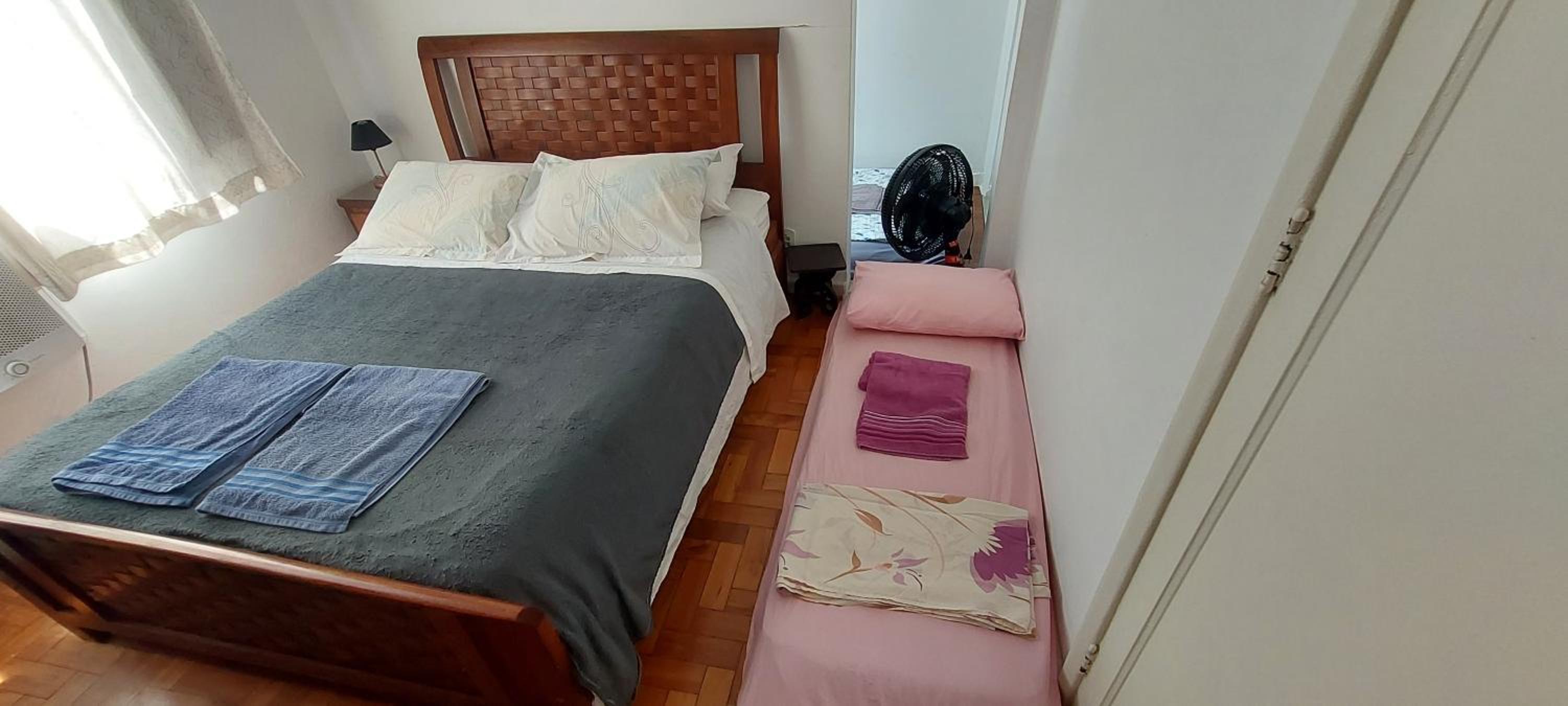 Lugar ideal Copacabana quarto, sala e lavanderia