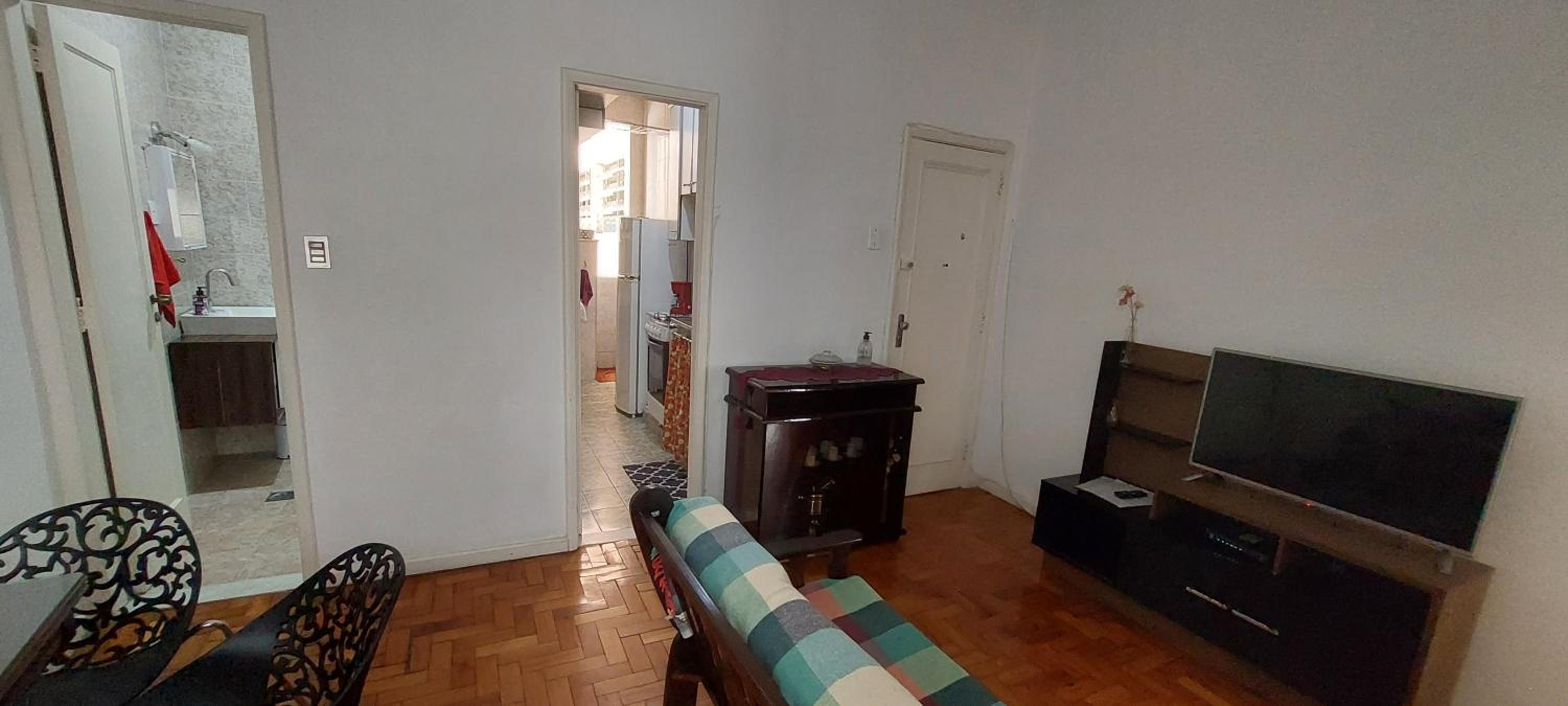 Lugar ideal Copacabana quarto, sala e lavanderia