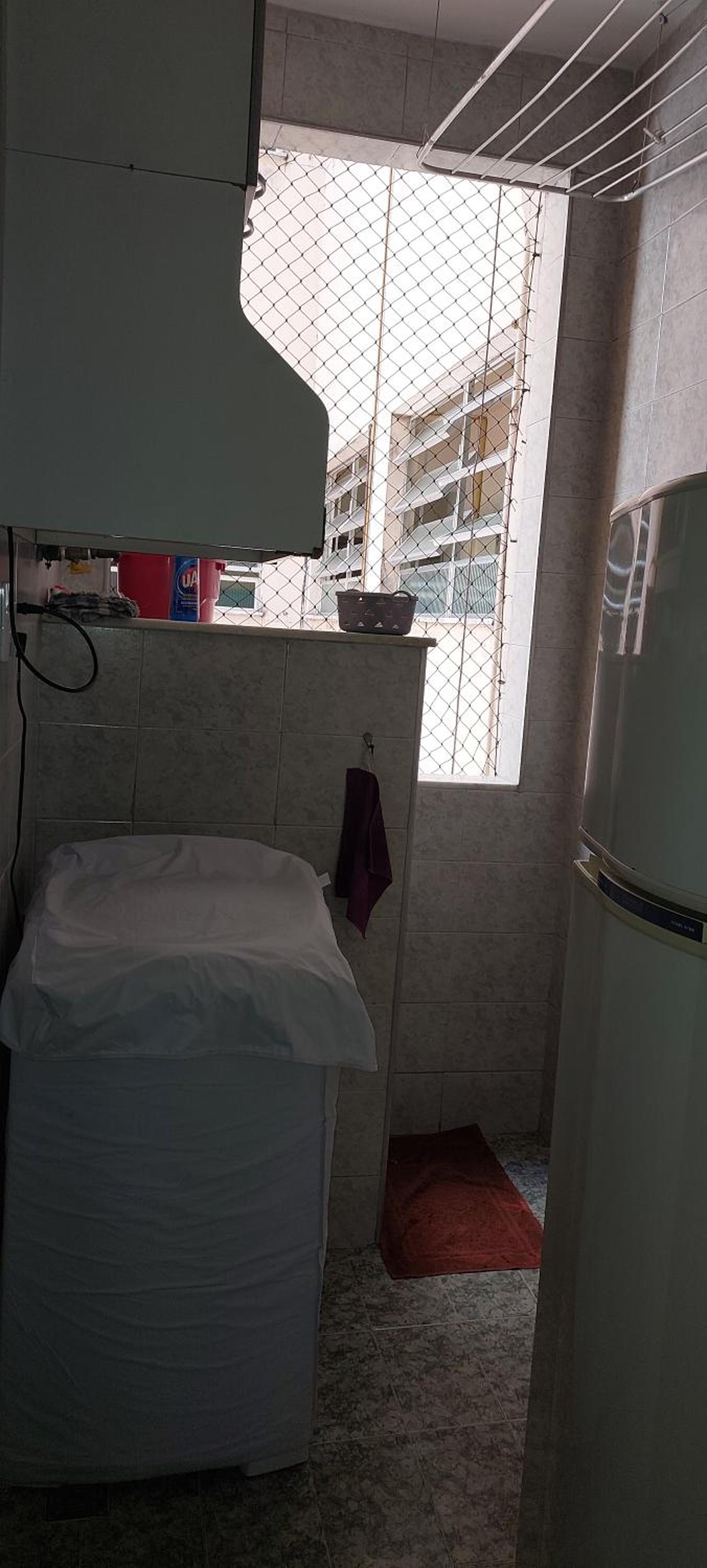 Lugar ideal Copacabana quarto, sala e lavanderia