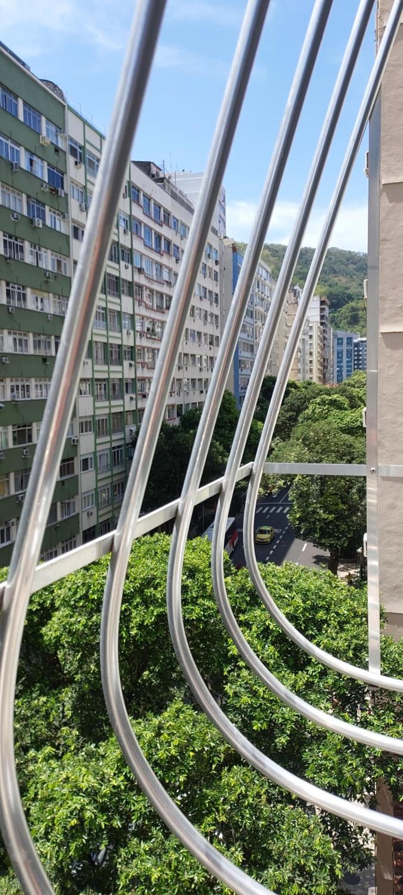 Lugar ideal Copacabana quarto, sala e lavanderia