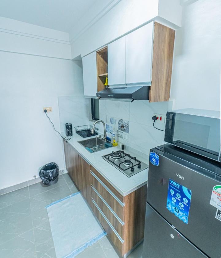 Cosy 1br furnished apt kilimani view 5