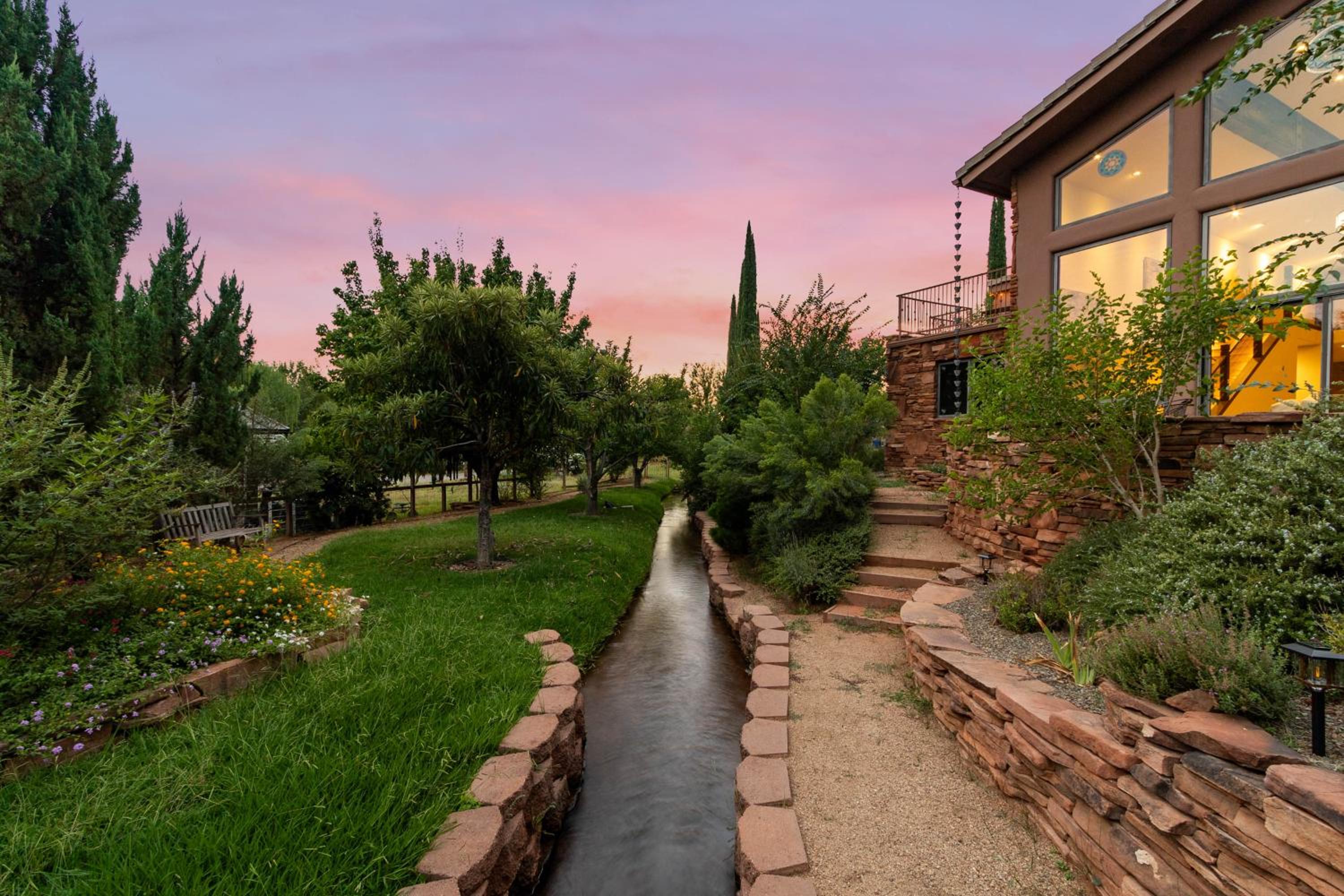 Beautiful Upscale Home with Views of Cathedral Rock, a Stream, Lush Fruit Trees view 5