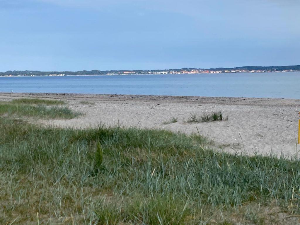 At Lovely Lyngsbæk Strand Near Ebeltoft, This Lovely Holiday Home Is At The End Of A Blind Path On A Beautiful, Large, Enclosed Plot, It Only Takes Approx,