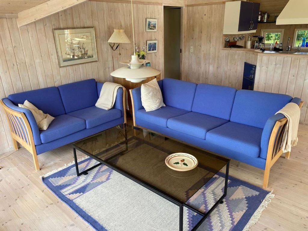 At Lovely Lyngsbæk Strand Near Ebeltoft, This Lovely Holiday Home Is At The End Of A Blind Path On A Beautiful, Large, Enclosed Plot, It Only Takes Approx,