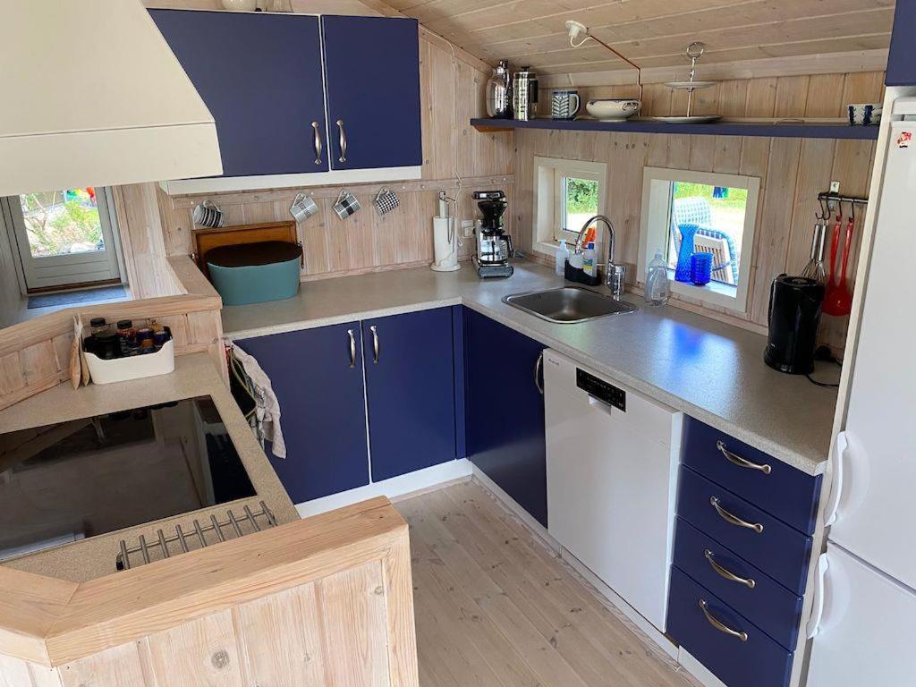 At Lovely Lyngsbæk Strand Near Ebeltoft, This Lovely Holiday Home Is At The End Of A Blind Path On A Beautiful, Large, Enclosed Plot, It Only Takes Approx,